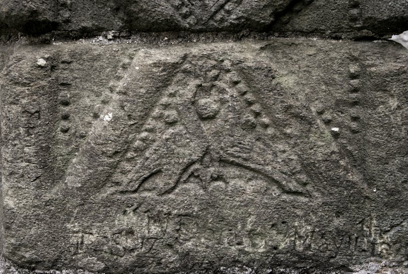 St. Saviour's Church: Birds and a Head