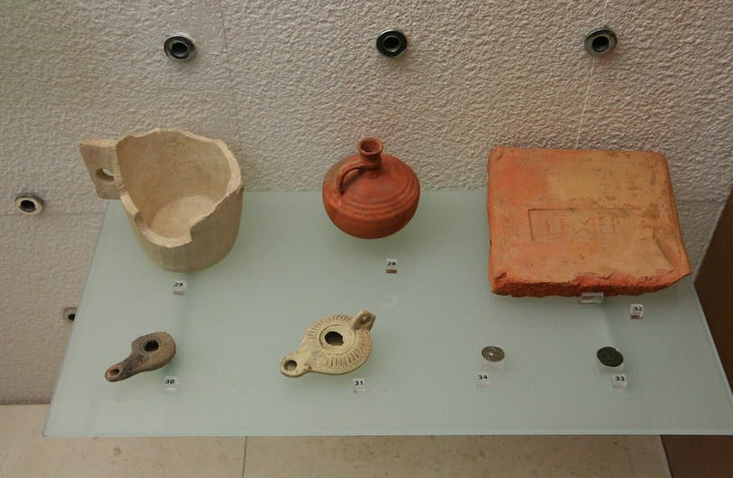 Museum Exhibits Including Oil Lamps from 1st Century AD
