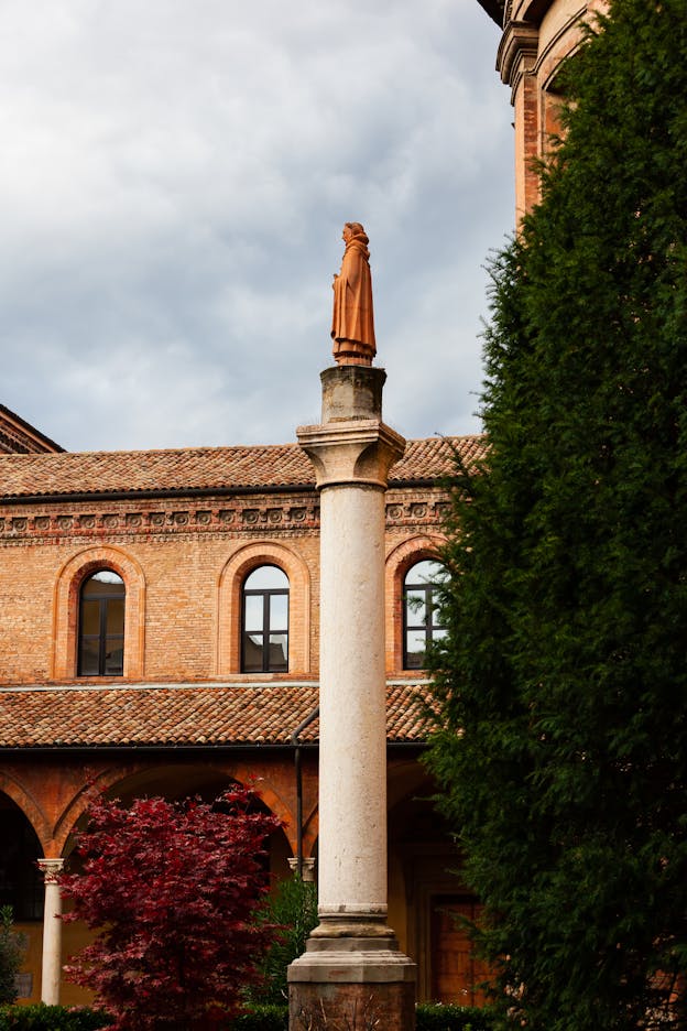 Pedestal Statue of St. Dominic in Cloister, Bologna, Italy