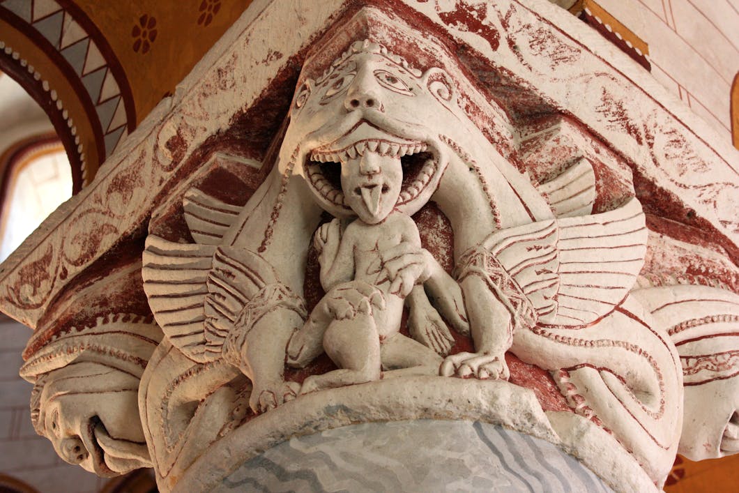 Capital: Dragon Devouring a Human