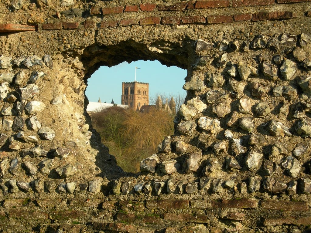 Norman Tower of St Albans Cathedral Seen Through Hole in Roman Wall