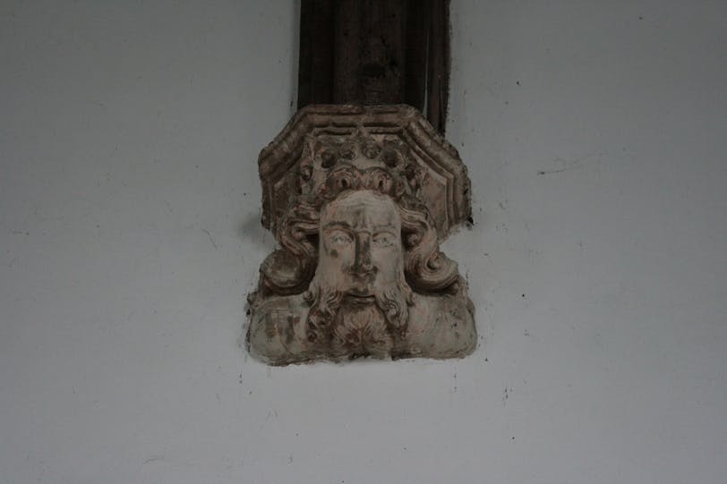 Stone Corbel-Head Below Nave Roof