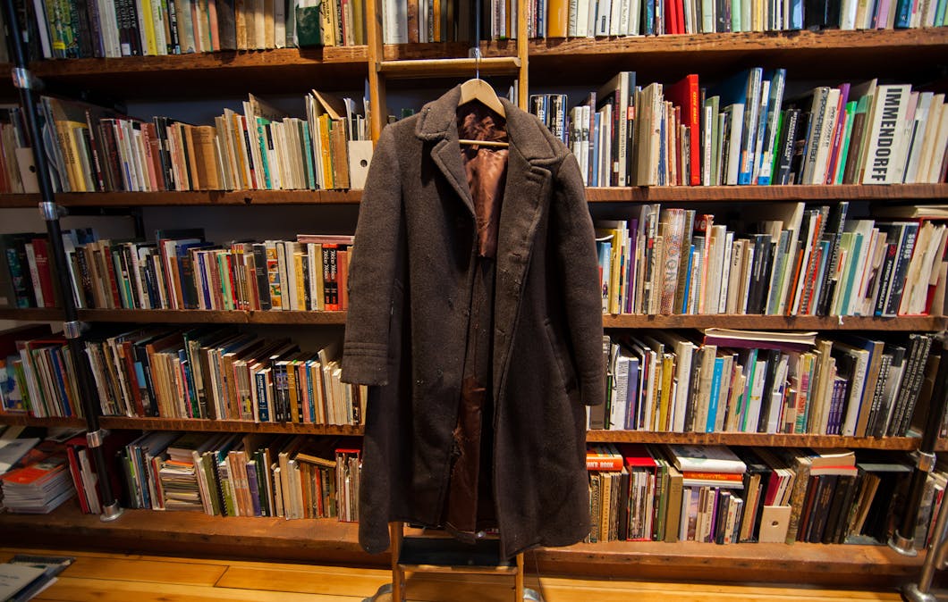 Library with "Expose Yourself to Art" Overcoat