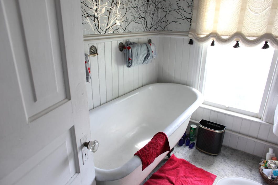 bathroom with antique tub